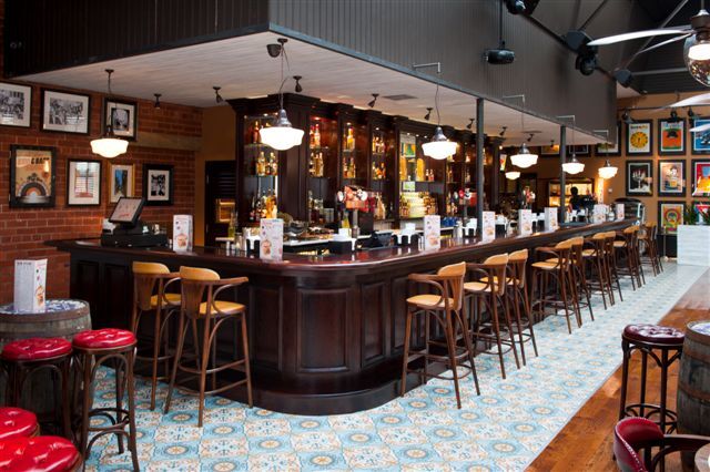 Revolution de Cuba Sheffield bar fit-out — atmospheric Cuban-inspired interior with feature bar joinery