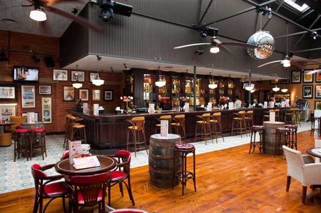Revolution de Cuba Sheffield — feature bar counter and back-bar with spirit display
