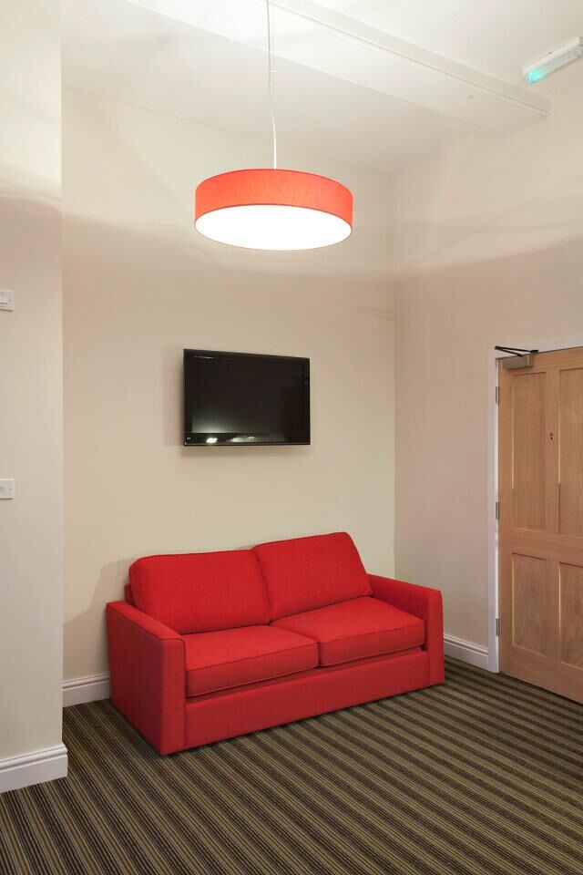 The Blue Boar Hotel — guest lounge and soft-seating area fit-out
