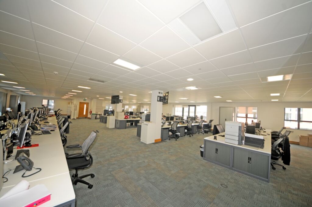 Investec Leeds — corridor and circulation finishes during phased refurbishment
