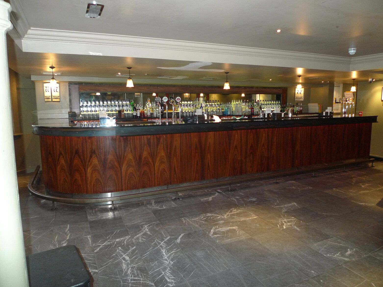 Revolution Brighton — feature bar counter and back-bar with spirit display