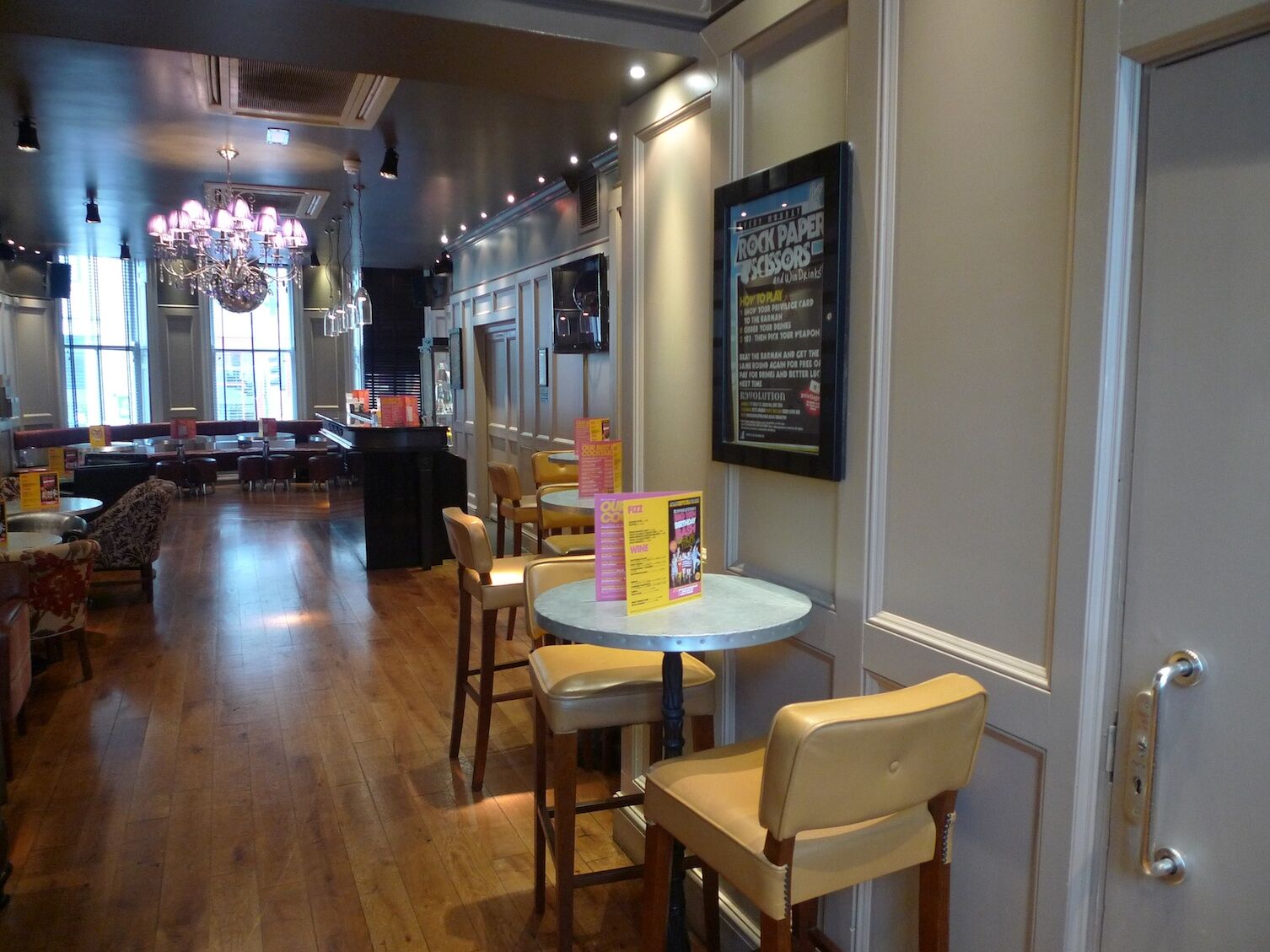 Revolution Brighton — bar seating area and decorative wall finishes