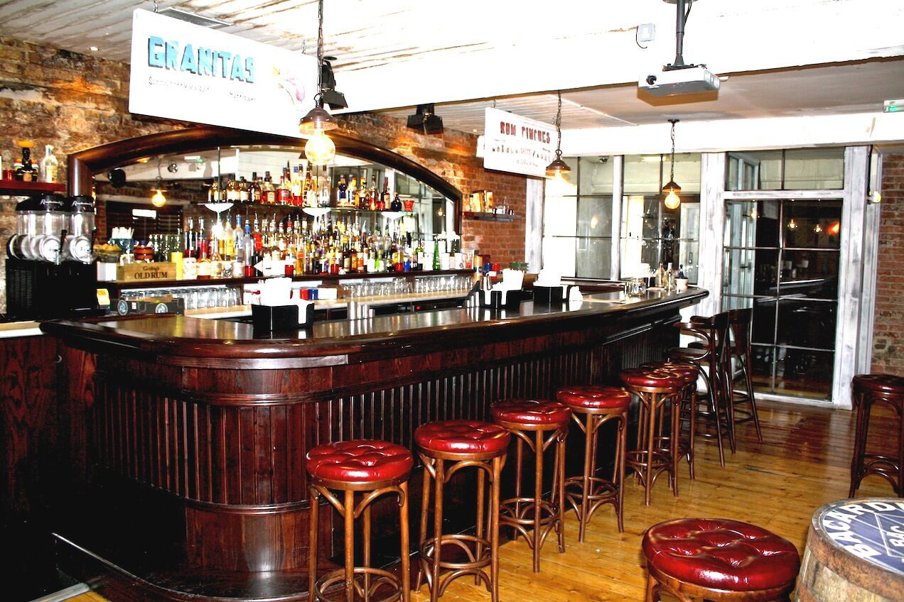 Revolution Leeds — feature bar counter and back-bar joinery