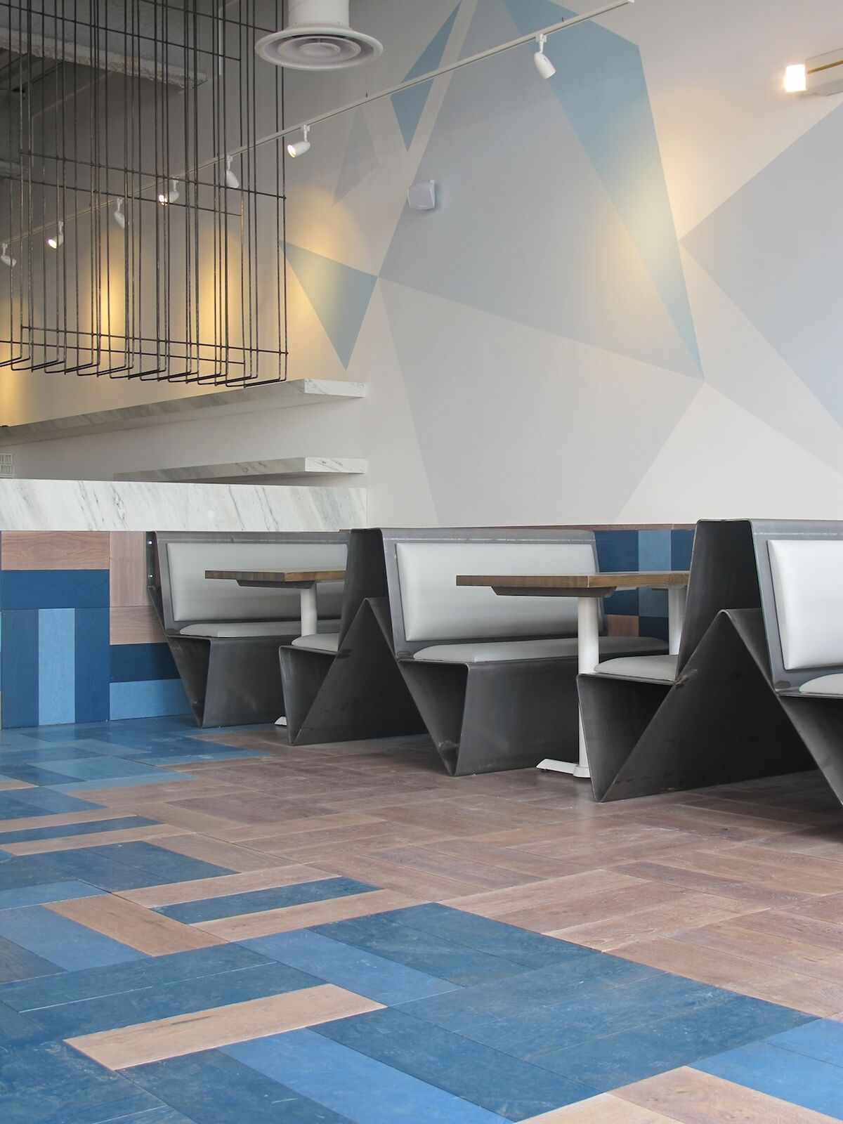 Zizzi Mermaid Quay Cardiff — seating area and decorative details