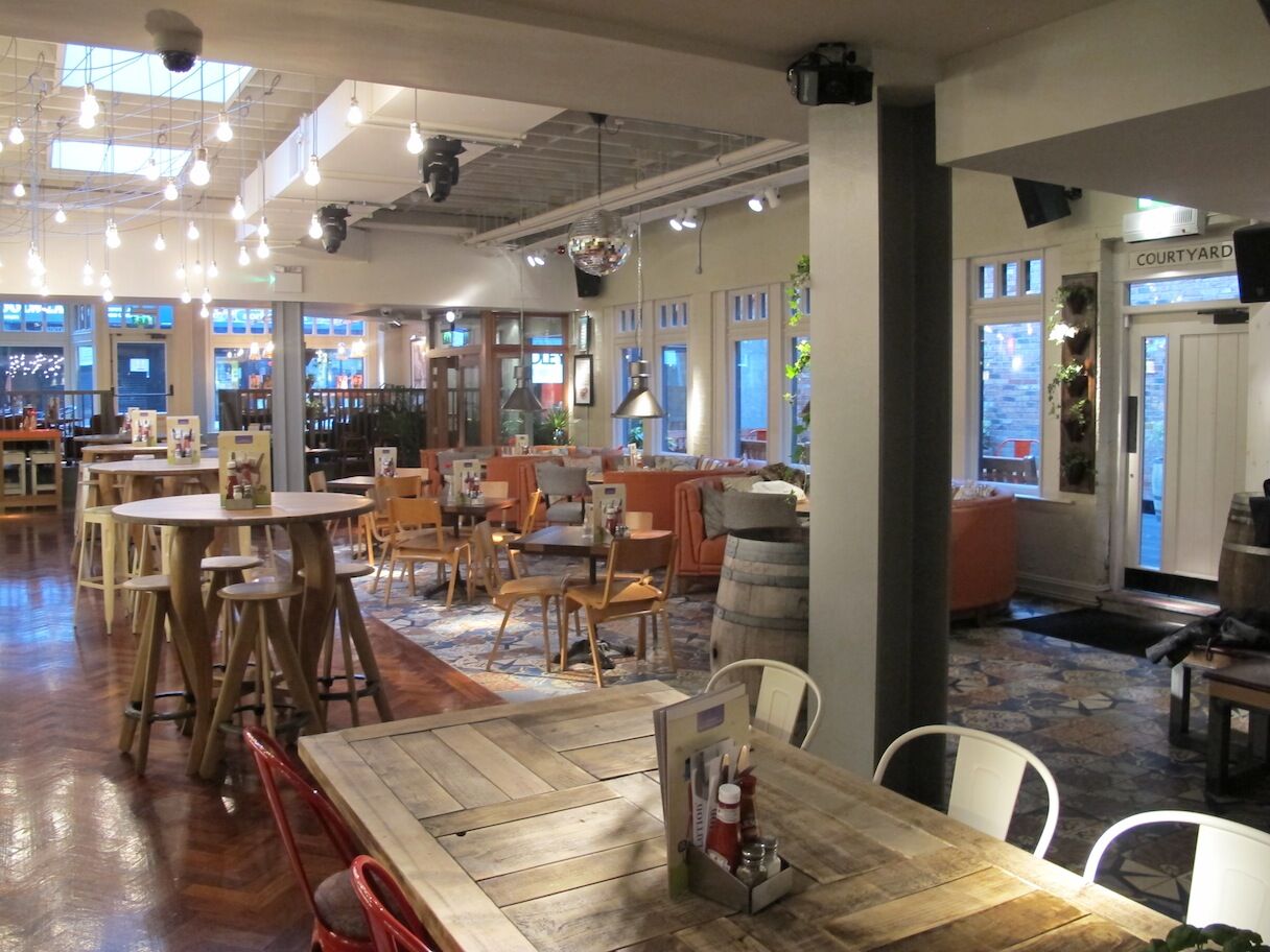 Revolution Macclesfield — bespoke booth joinery and seating