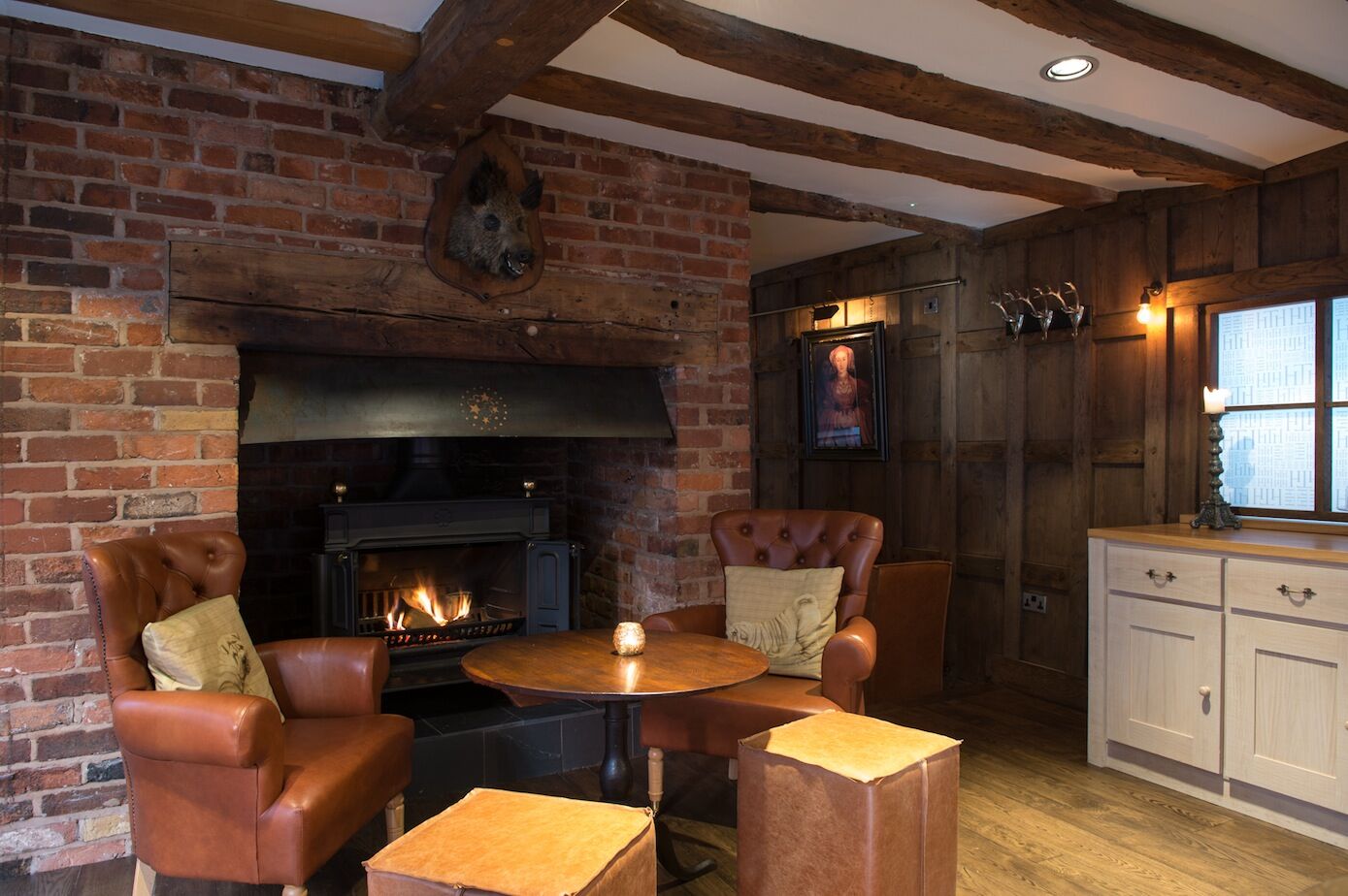 Henry Tudor House Shrewsbury — bar seating and decorative lighting