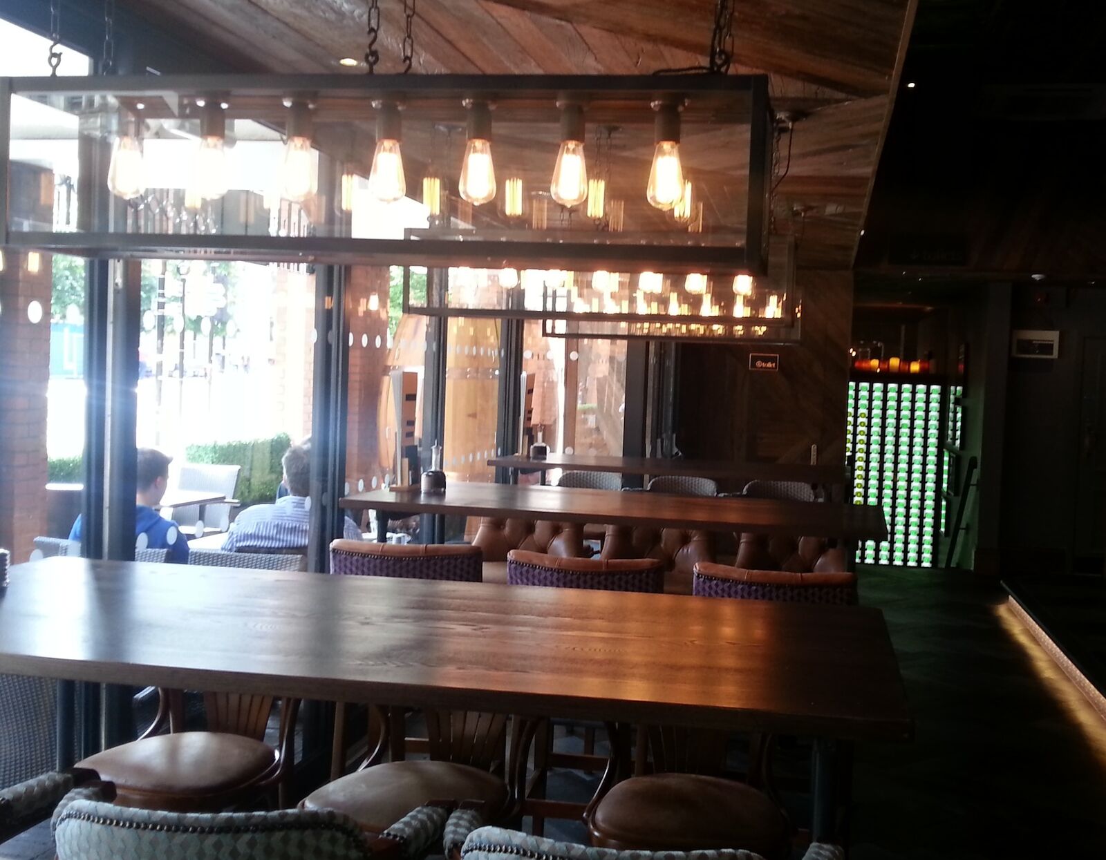 Duttons Manchester — bar seating and feature lighting