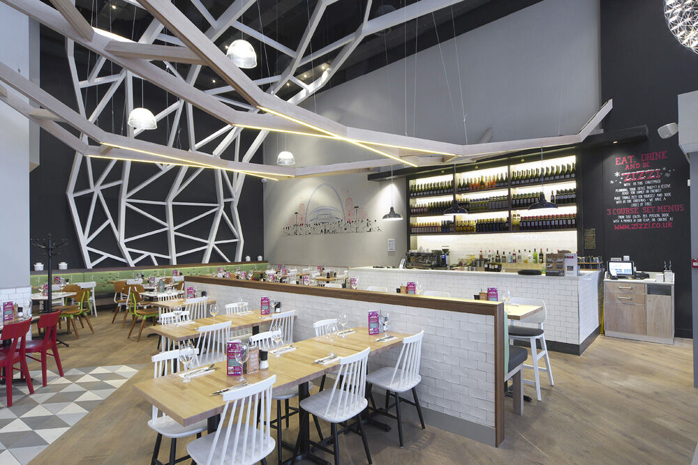 Zizzi Wembley — dining seating and decorative wall features