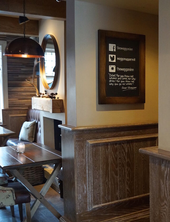 The Waggon Uppermill — feature fireplace and lounge area fit-out
