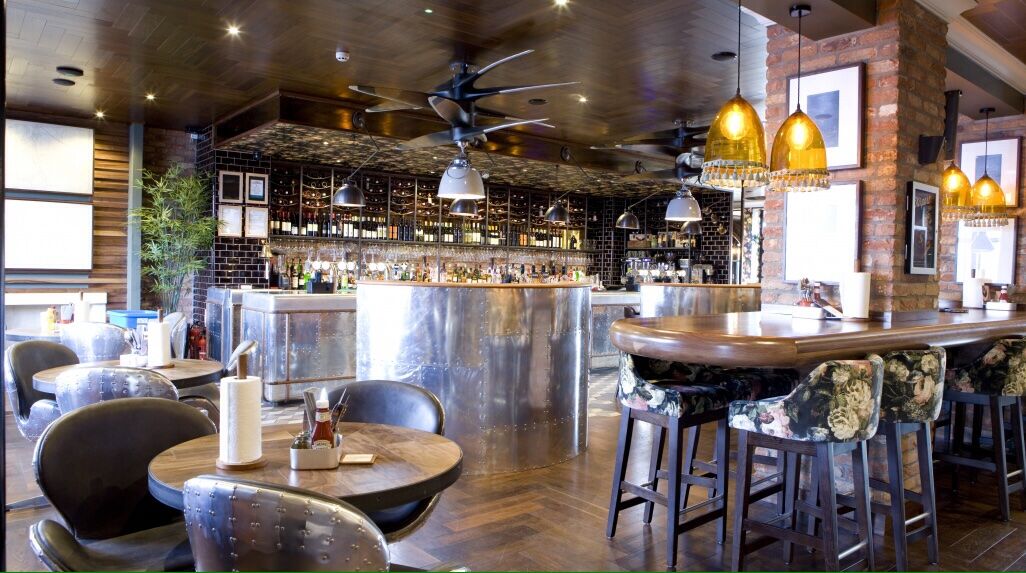 The Airport Manchester — atmospheric bar seating and lighting scheme