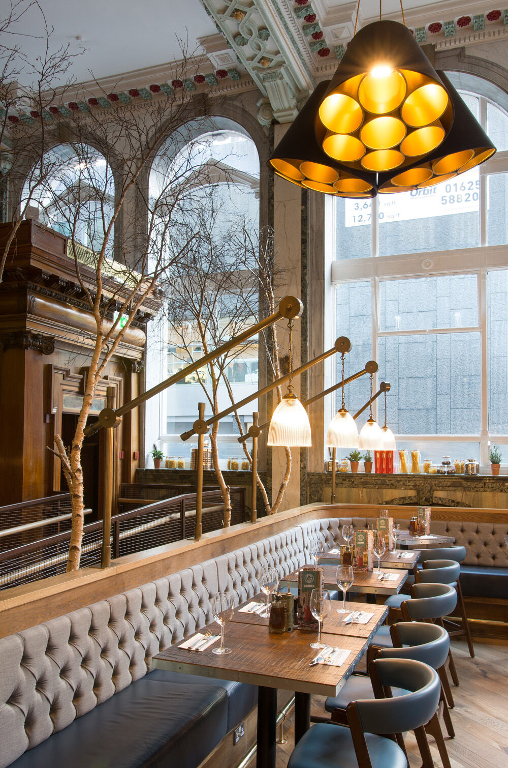 Zizzi King Street Manchester — bar seating and feature lighting detail